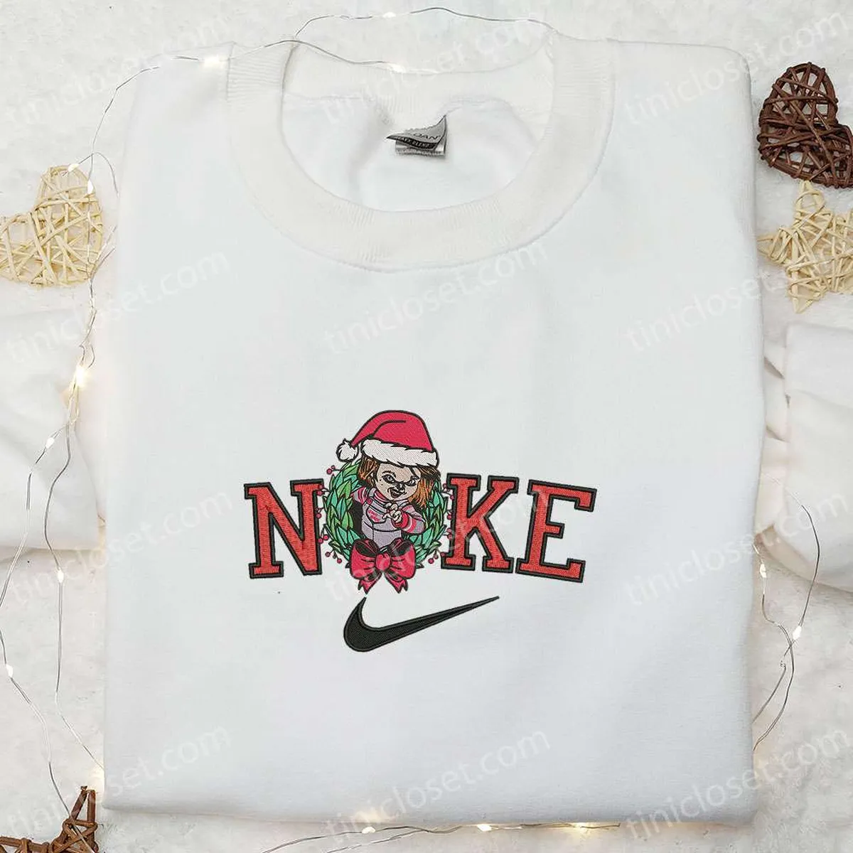 Chucky Laurel Wreath x Nike Christmas Embroidered Sweatshirt, Cartoon Christmas Embroidered Shirt, Best Christmas Gift Ideas Chucky Laurel Wreath x Nike Christmas Embroidered Sweatshirt, Cartoon Christmas Embroidered Shirt, Best Christmas Gift Ideas