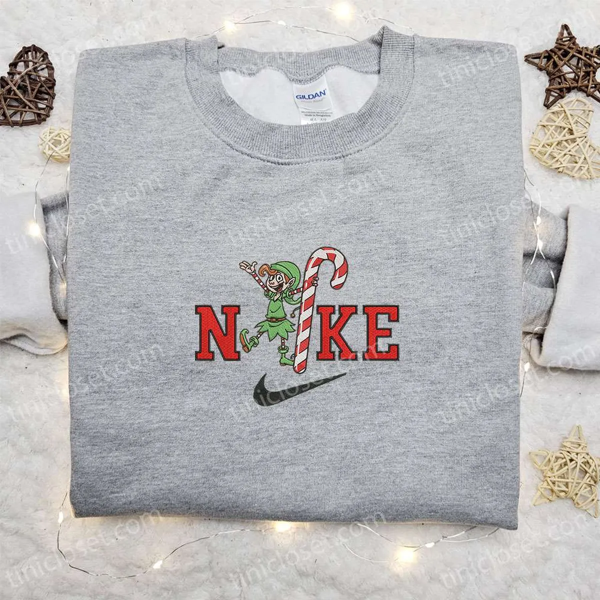 Elf and Candy Cane x Nike Christmas Embroidered Sweatshirt, Christmas Embroidered Shirt, Best Christmas Gift Ideas Elf and Candy Cane x Nike Christmas Embroidered Sweatshirt, Christmas Embroidered Shirt, Best Christmas Gift Ideas