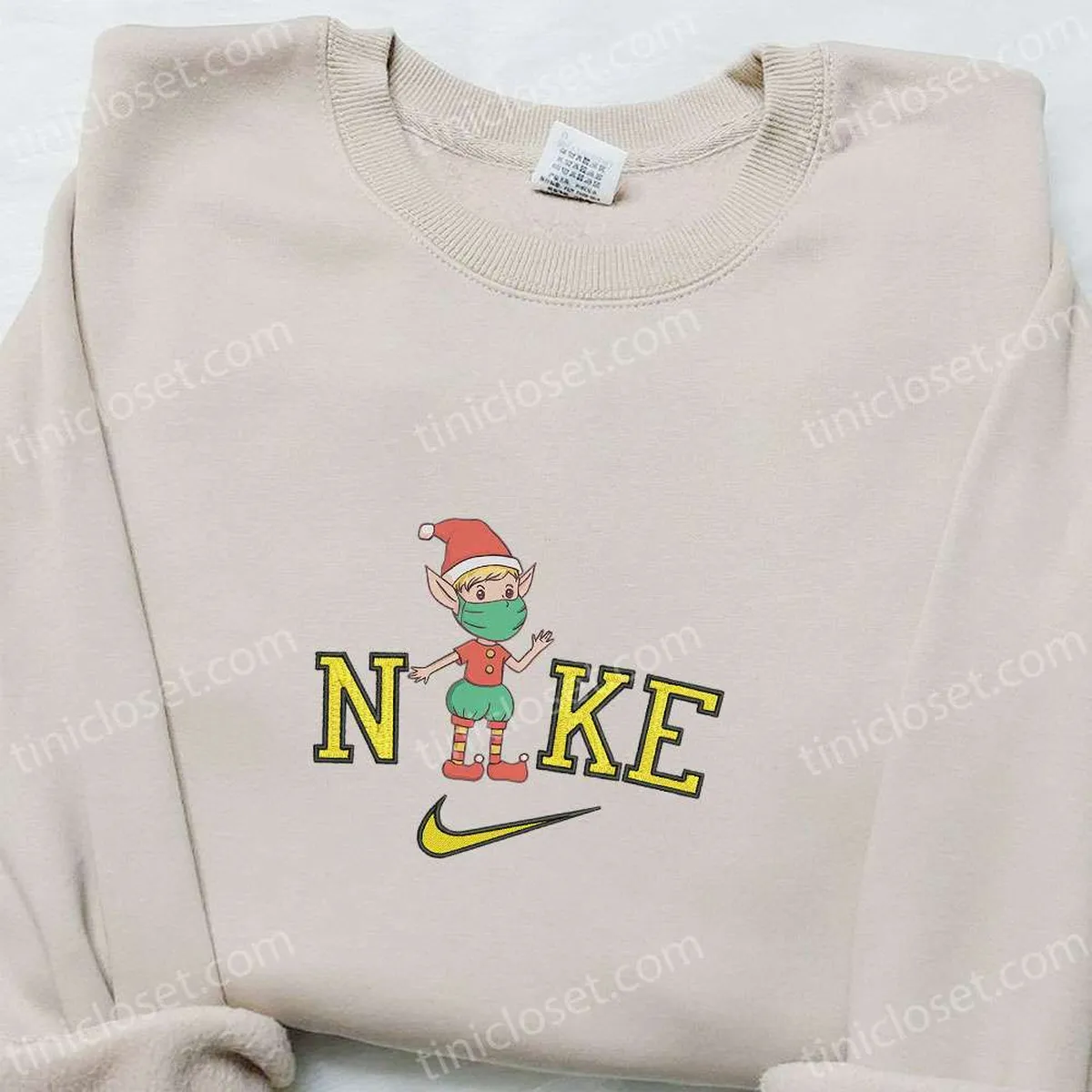 Nike x Elf Face Mask Christmas Embroidered Sweatshirt, Cartoon Christmas Embroidered Shirt, Best Christmas Gift Ideas