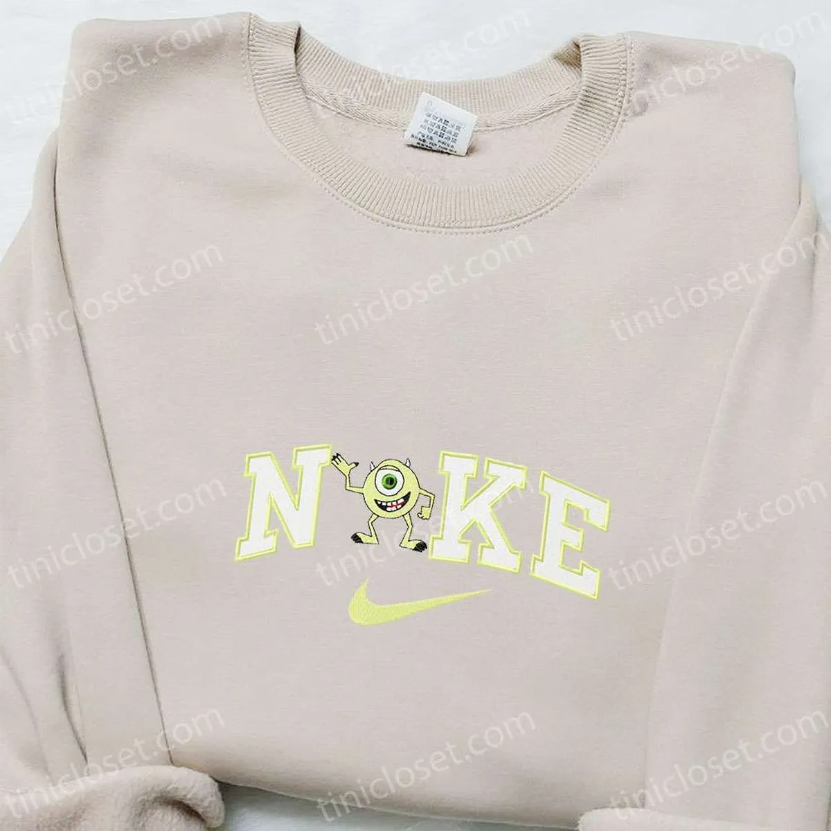 Nike x Mike Wazowski Embroidered Shirt, Disney Monsters Inc. Embroidered Sweatshirt, Best Gifts for Family Nike x Mike Wazowski Embroidered Shirt, Disney Monsters Inc. Embroidered Sweatshirt, Best Gifts for Family