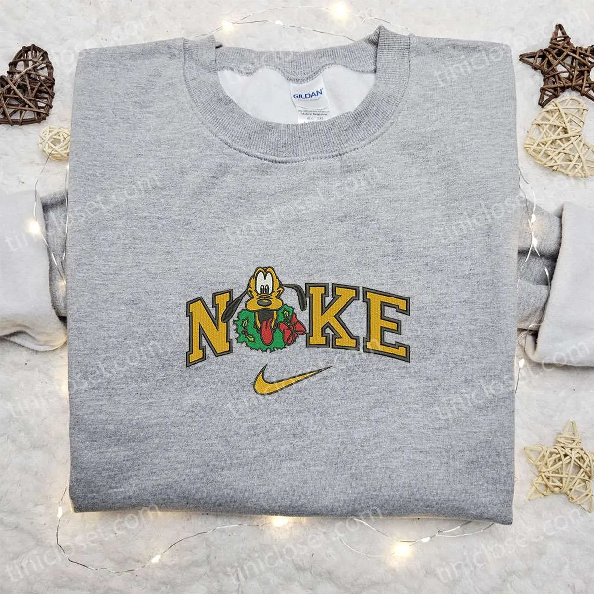 Pluto With Christmas Wreath x Nike Embroidered Shirt, Disney Characters Embroidered Hoodie, Best Christmas Gifts For Family Pluto With Christmas Wreath x Nike Embroidered Shirt, Disney Characters Embroidered Hoodie, Best Christmas Gifts For Family