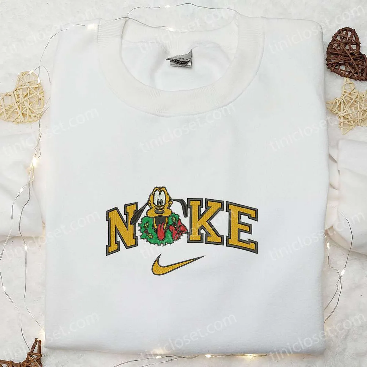 Pluto With Christmas Wreath x Nike Embroidered Shirt, Disney Characters Embroidered Hoodie, Best Christmas Gifts For Family Pluto With Christmas Wreath x Nike Embroidered Shirt, Disney Characters Embroidered Hoodie, Best Christmas Gifts For Family