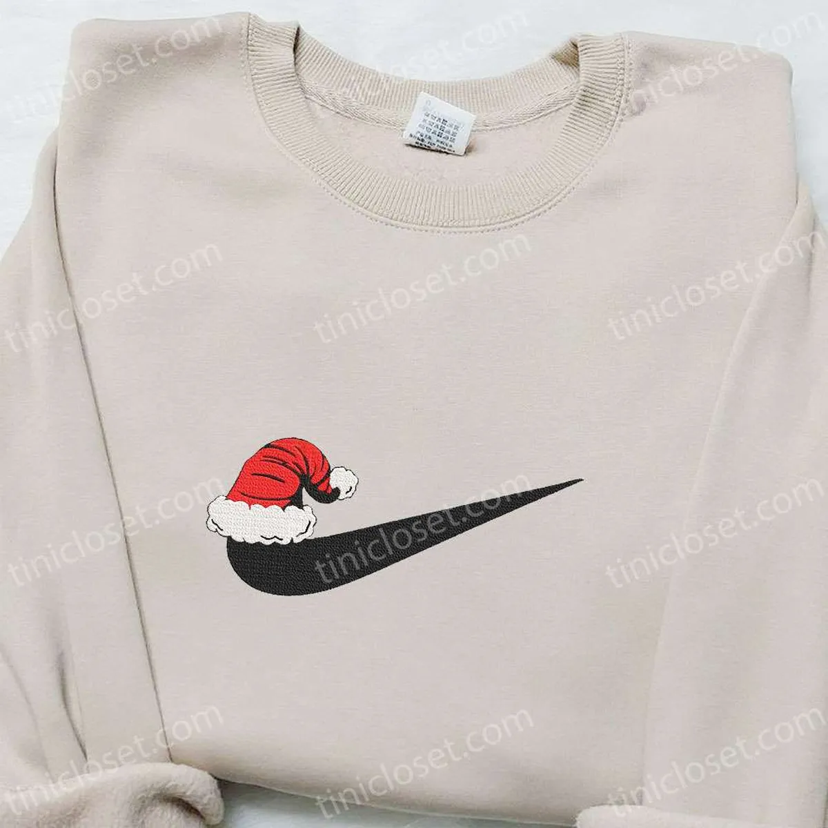 Santa Hat x Swoosh Embroidered Sweatshirt, Christmas Embroidered Shirt, Best Christmas Gift Ideas for Family Santa Hat x Swoosh Embroidered Sweatshirt, Christmas Embroidered Shirt, Best Christmas Gift Ideas for Family